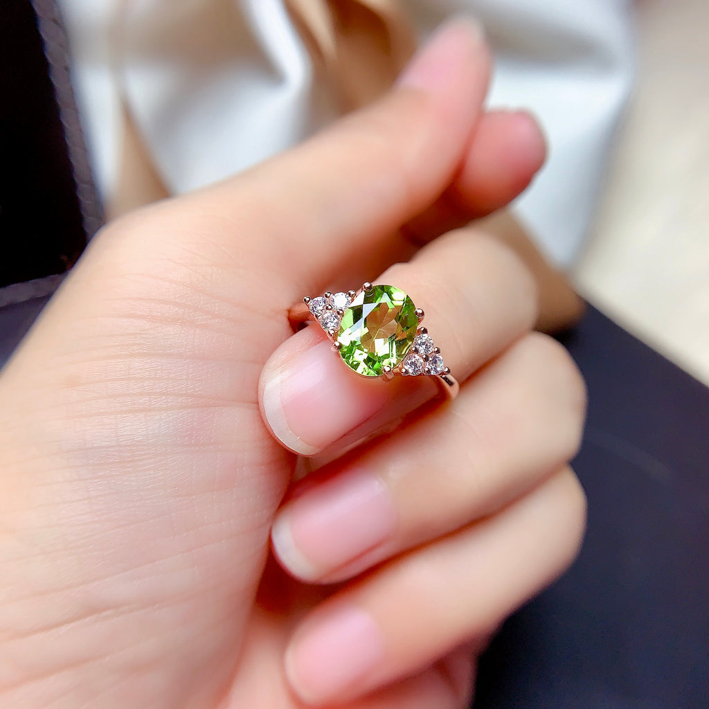 Green gemstone fashion ring close-up