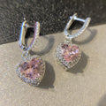 trendy rosy earrings with tassel and crystals